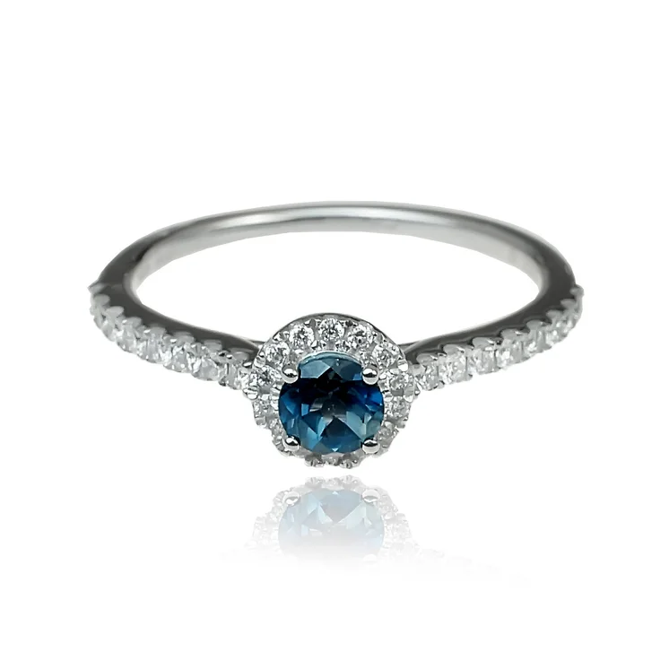 Zlatý prsteň s london blue topásom a diamantmi Zlatý prsteň s london blue topásom a diamantmi