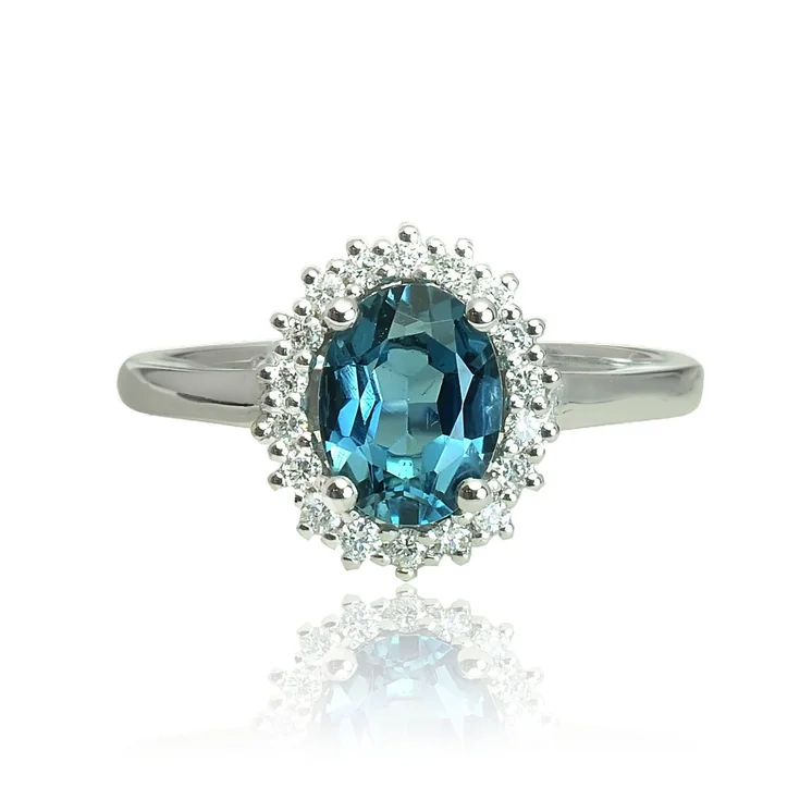 Zlatý prsteň s london blue topásom a diamantmi Zlatý prsteň s london blue topásom a diamantmi